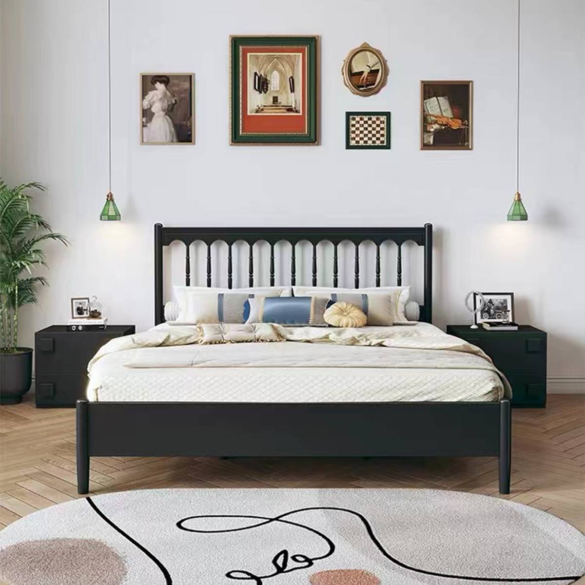 Alternative styling of the black spindle bed with different bedding and wall art