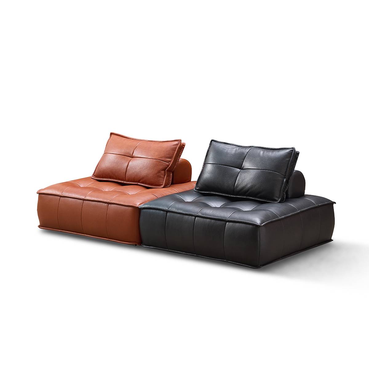 Side view of brown and black tufted leather single-seater sofas