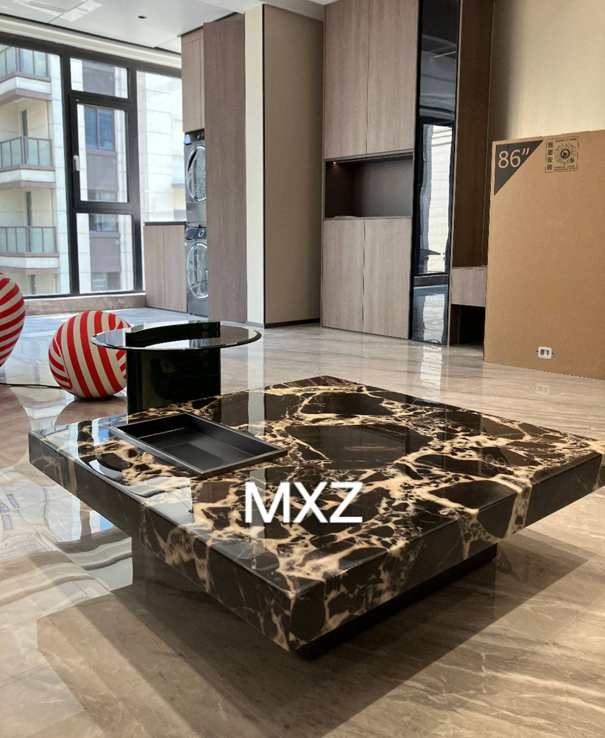 Black and gold marble coffee table in a living room