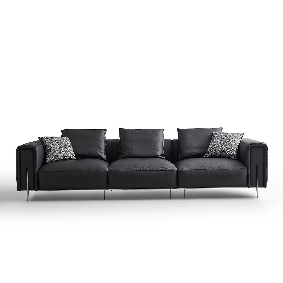 Front view of the black leather sofa showing the four-seat layout