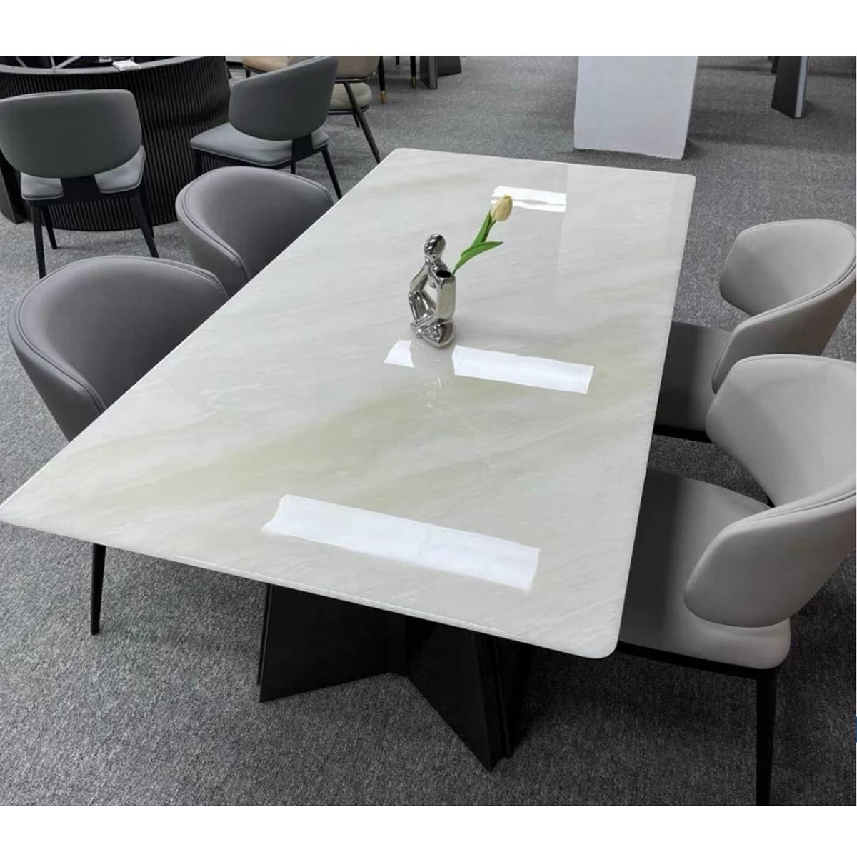 High angle view of the Milan White Jade dining table showing the marble texture