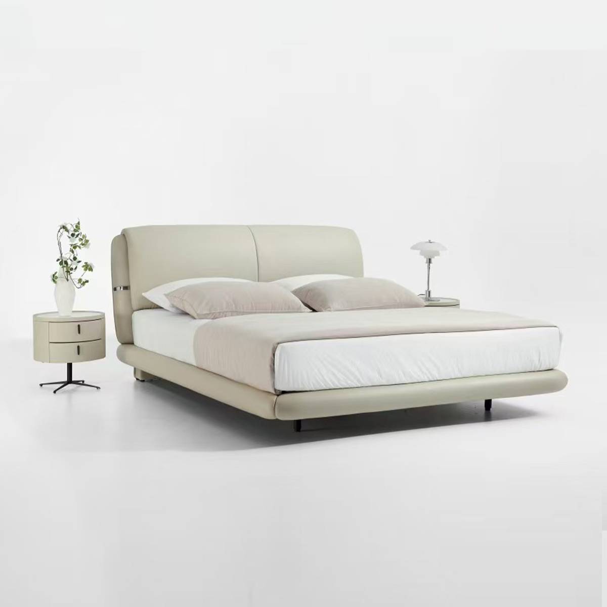 Side angle view of the beige upholstered bed
