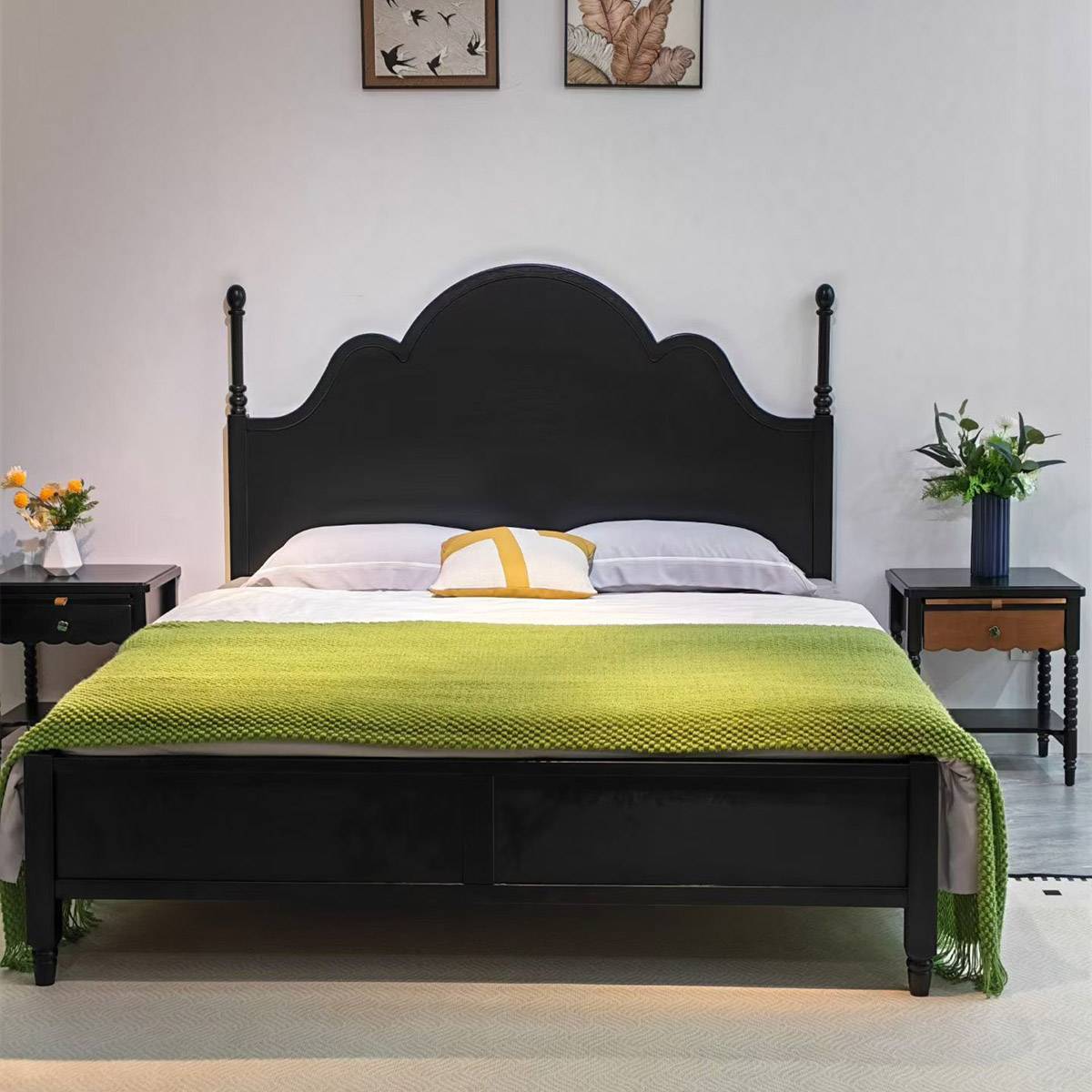 Black finish mid-century solid wood bed with green throw blanket