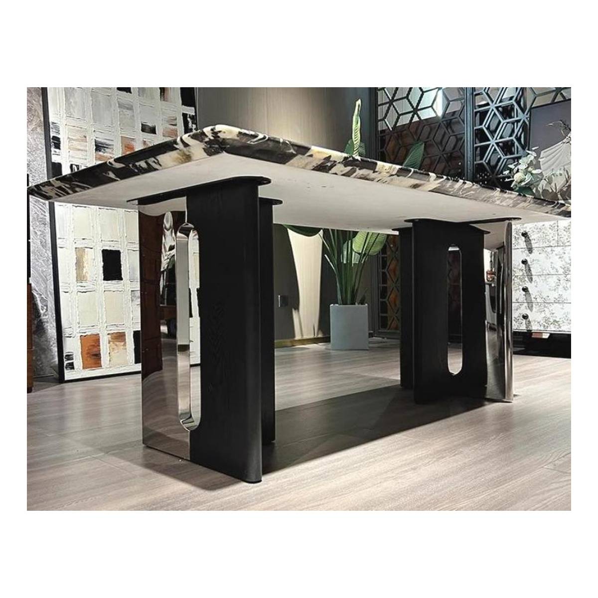 Side view of the dining table showing the T-shaped chrome and black base