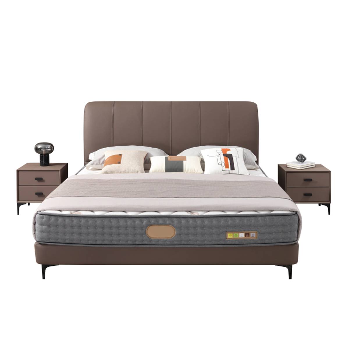 Full view of the bed with matching bedside tables and bedding