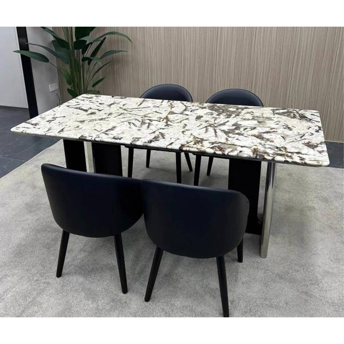 Front view of the Snow Mountain Flying Fox marble dining table showing the T-base