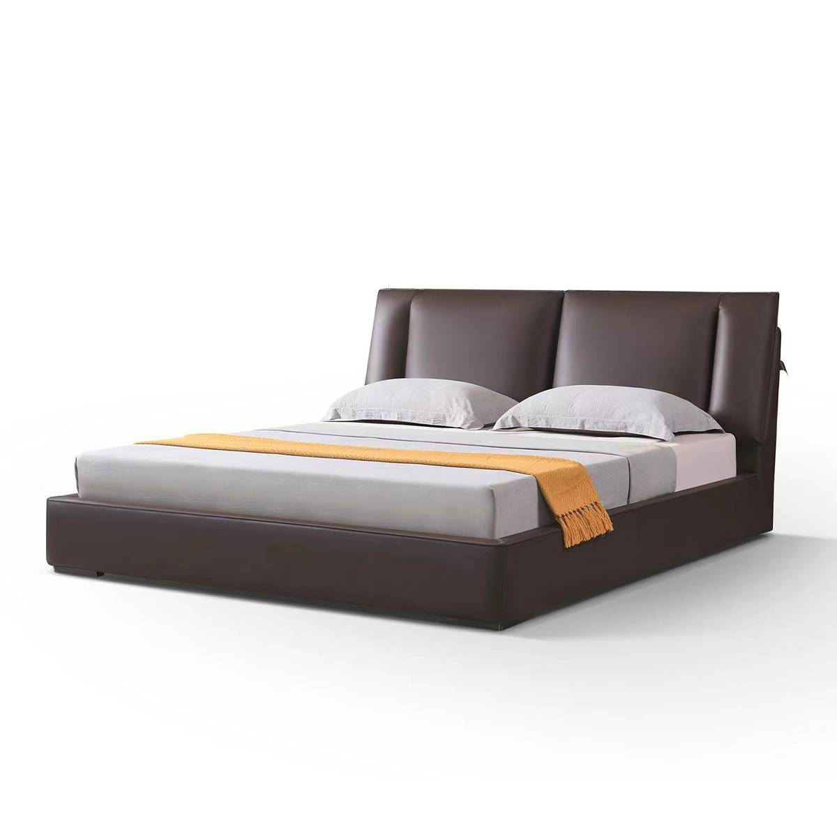 Angled view of the brown leather bed showing the headboard and frame structure