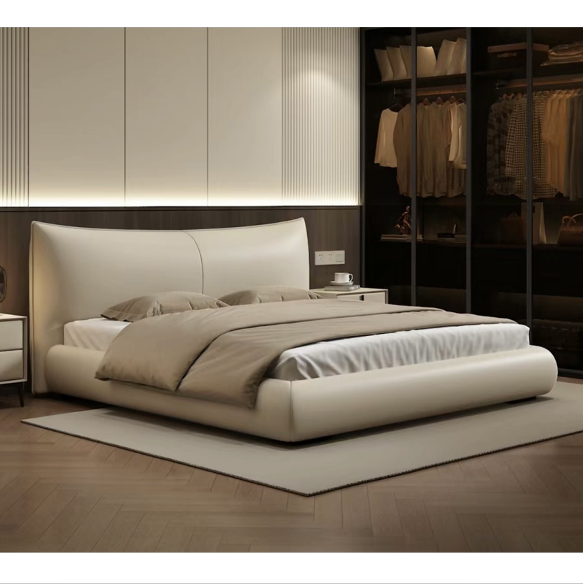 White leather version of the bed in a bedroom setting