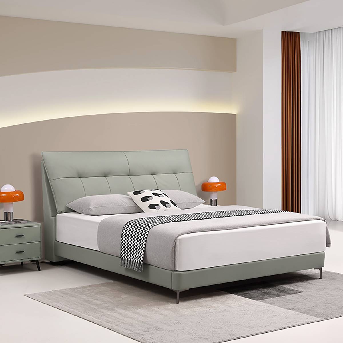 Side angle view of the bed showing the headboard and bedside table