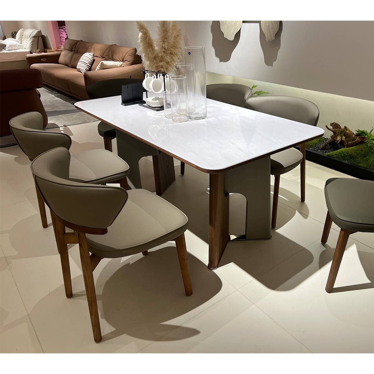 Side angle view of the dining table in a showroom setting