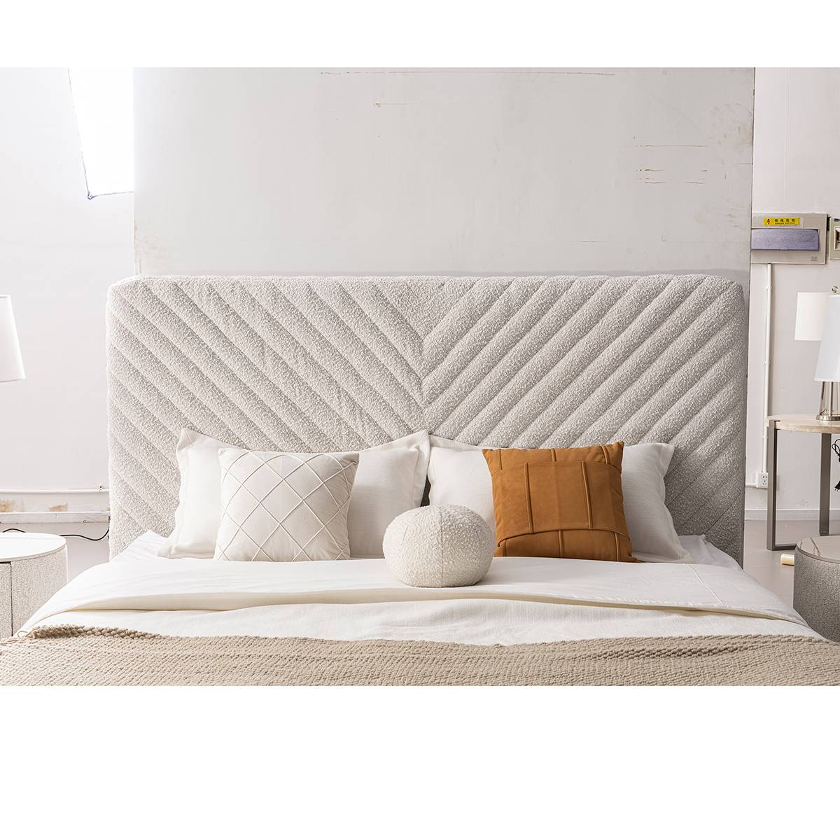 Close-up view of the bed headboard and pillows