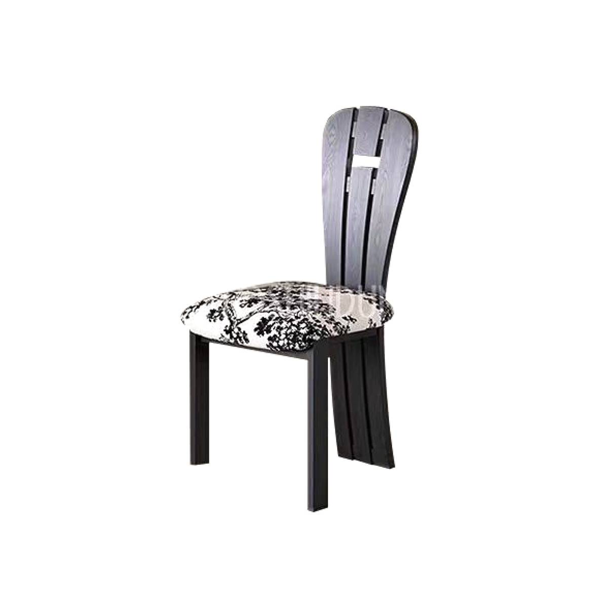 Black finish mid-century dining chair with patterned seat