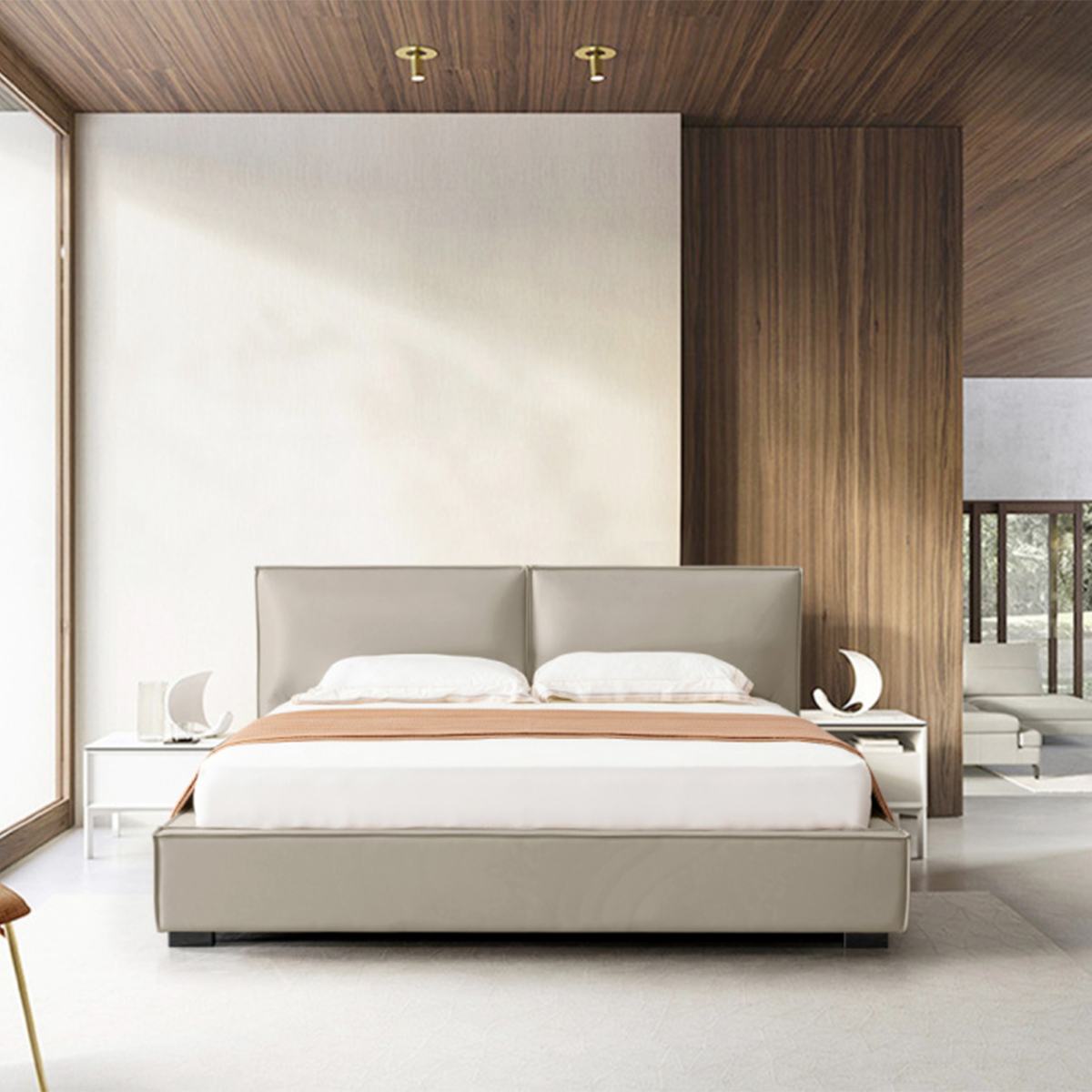 Front view of a beige leather soft bed in a modern bedroom setting