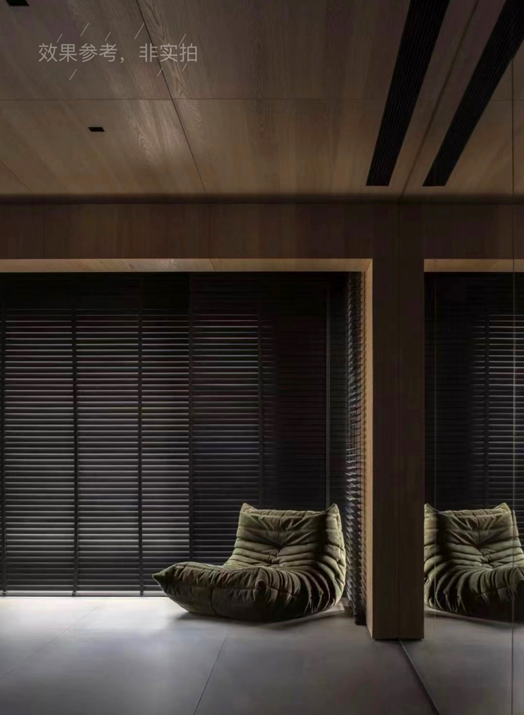 Green caterpillar sofa placed in a modern room with wooden ceiling and blinds