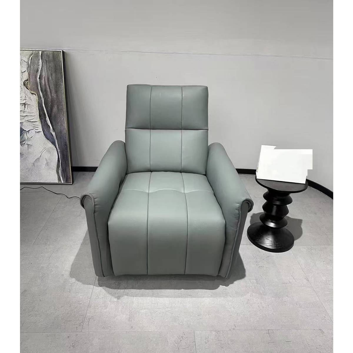 Front view of the grey electric recliner chair