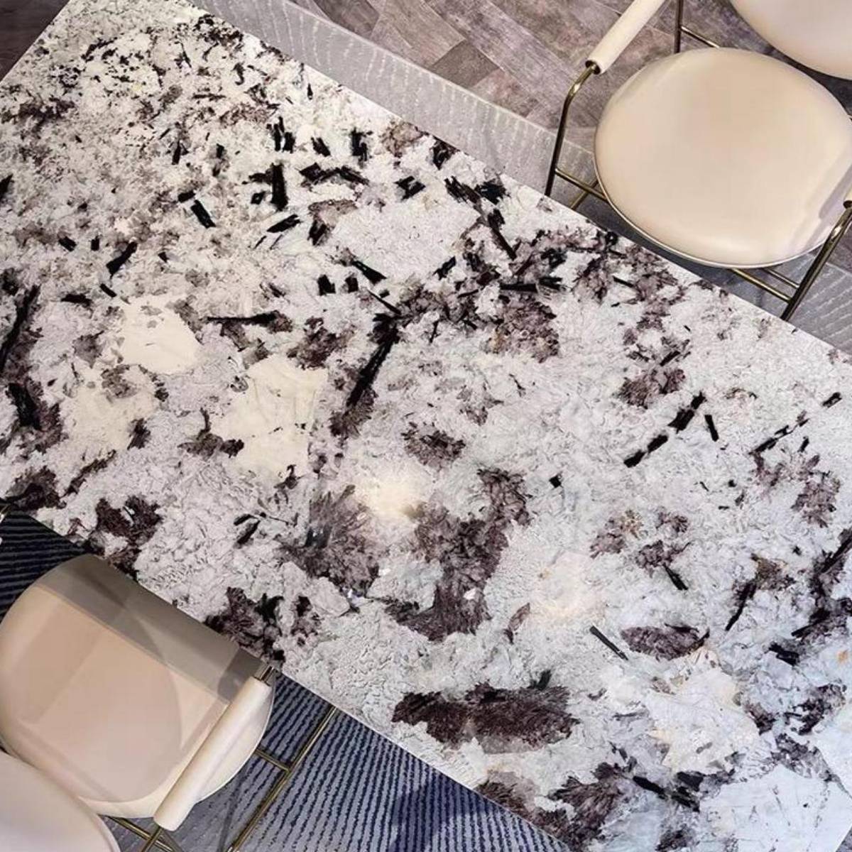 Close-up overhead view of the Snow Mountain Blue marble table surface texture