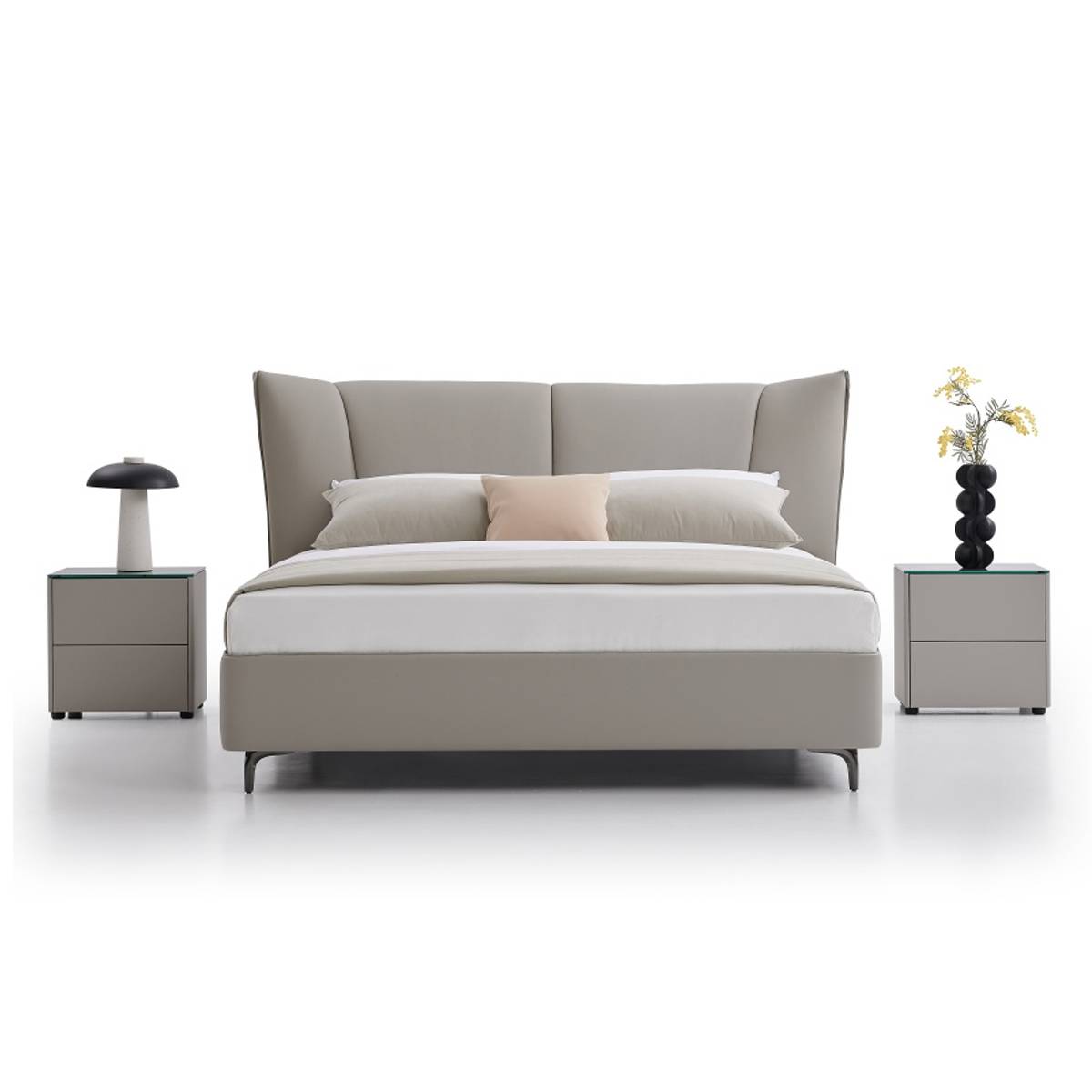 Front view of the grey upholstered bed with two bedside tables