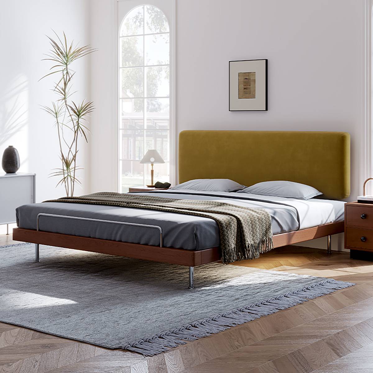 Side view of the bed with a mustard yellow velvet headboard variation