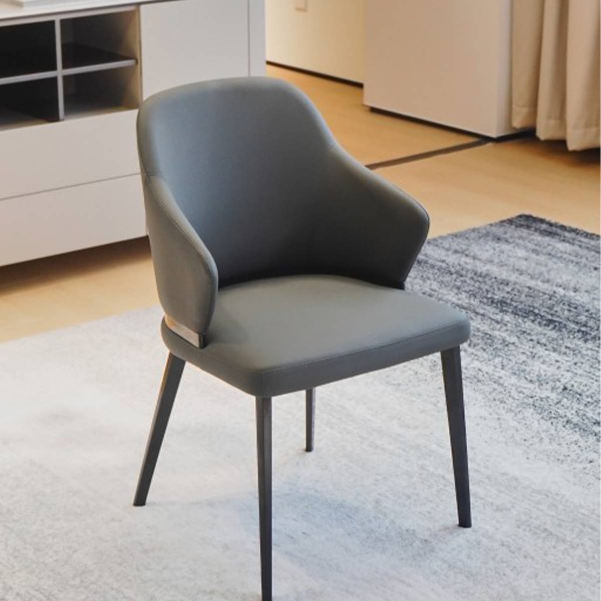 Front view of deep grey dining chair