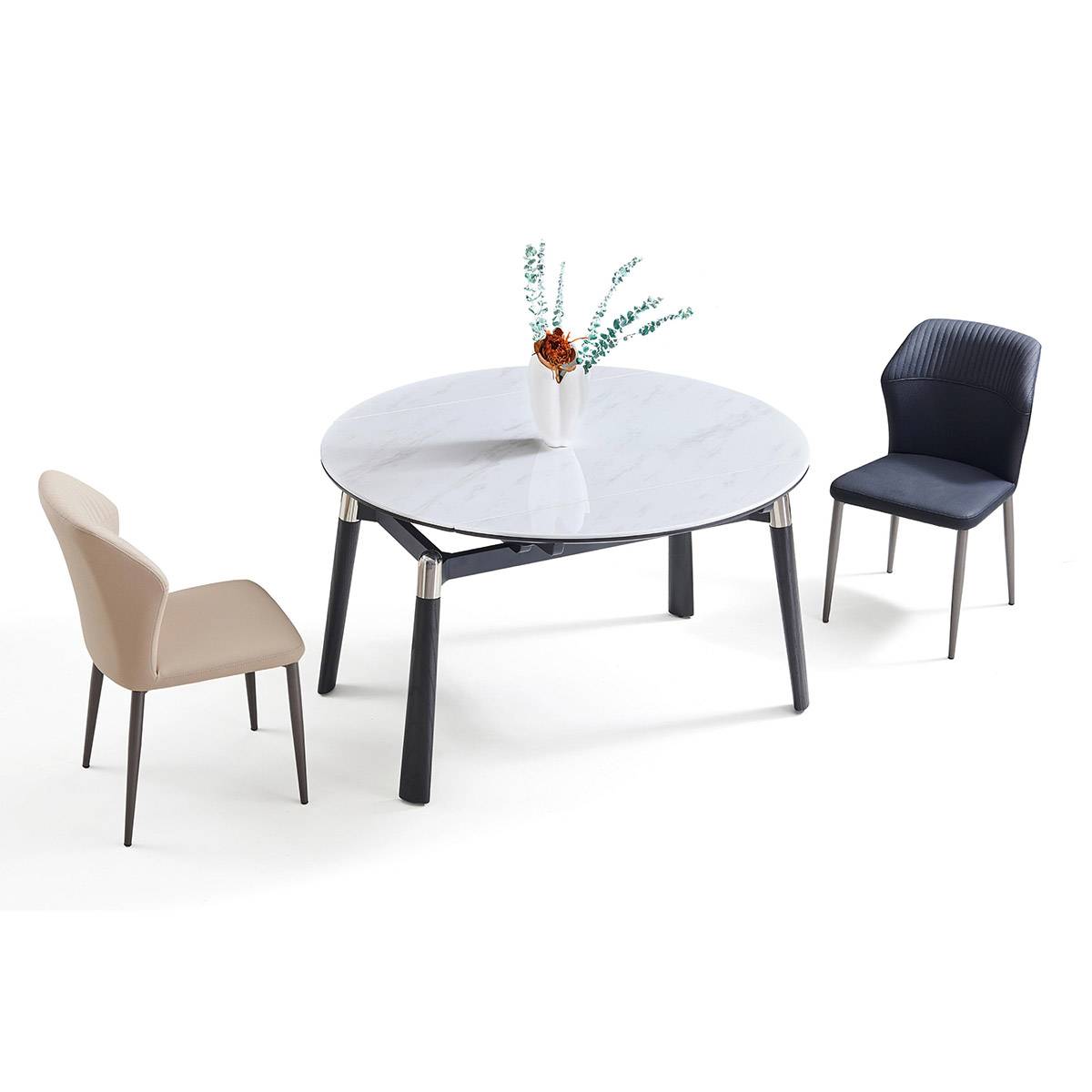 Dining table shown with two chairs in a living room setting