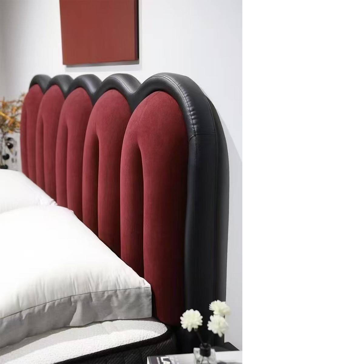 Detail shot of the scalloped headboard texture and material