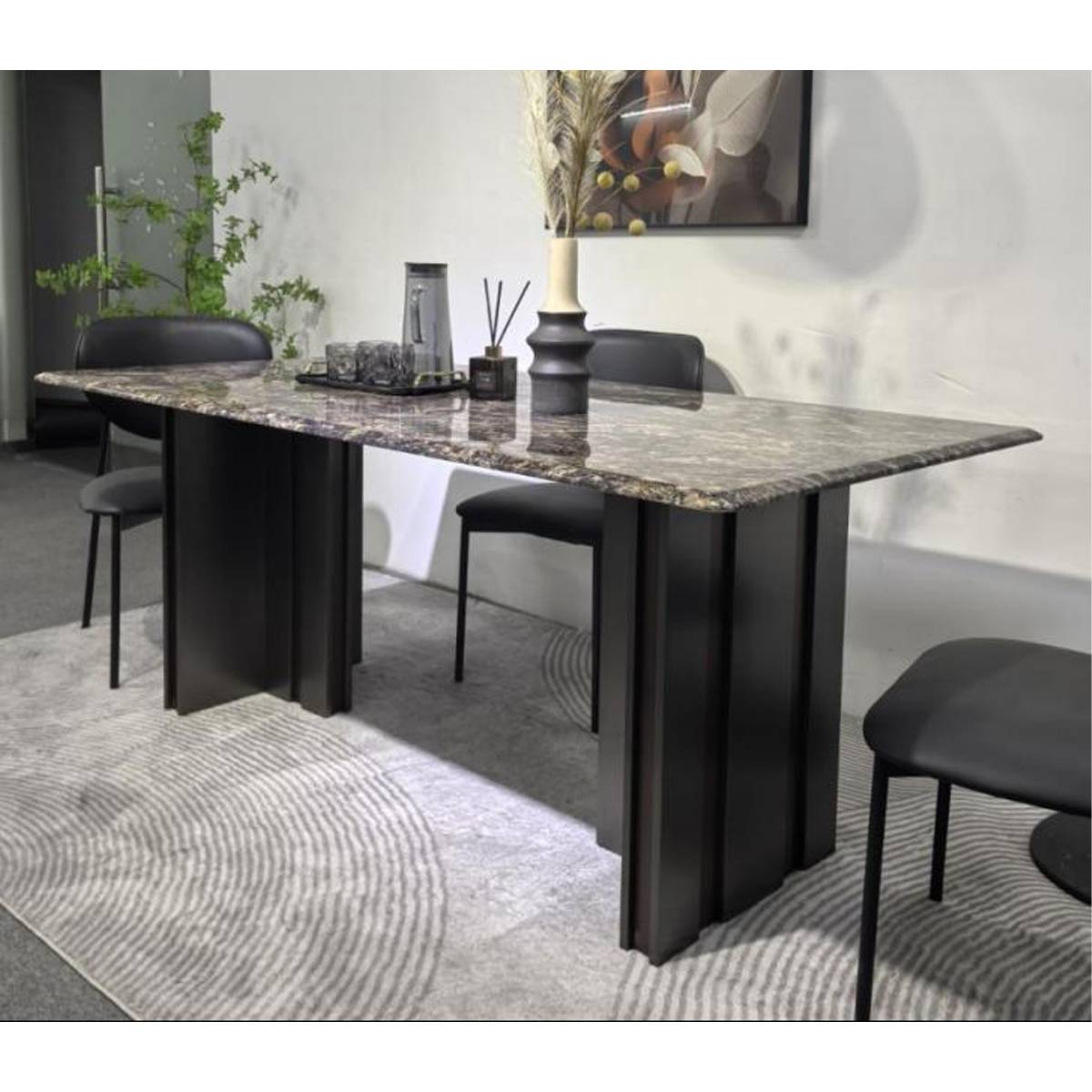 Side view of the dining table showing the thick marble edge and base structure