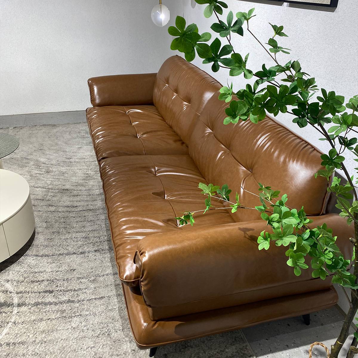 High angle view of brown leather sofa showing seat cushions