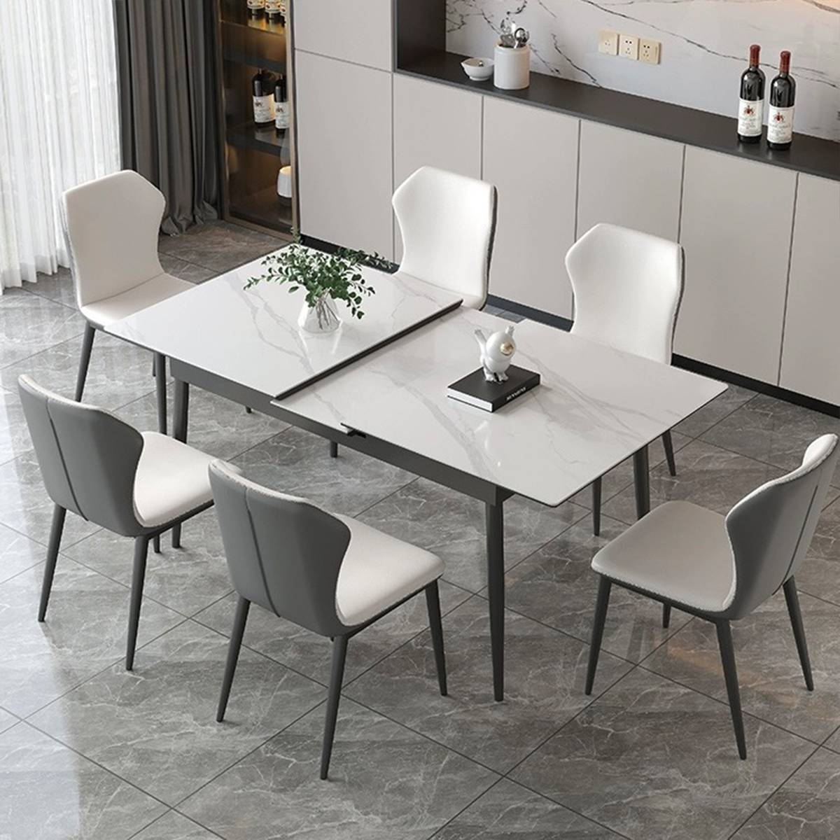 Dining table partially extended showing the gap between sections