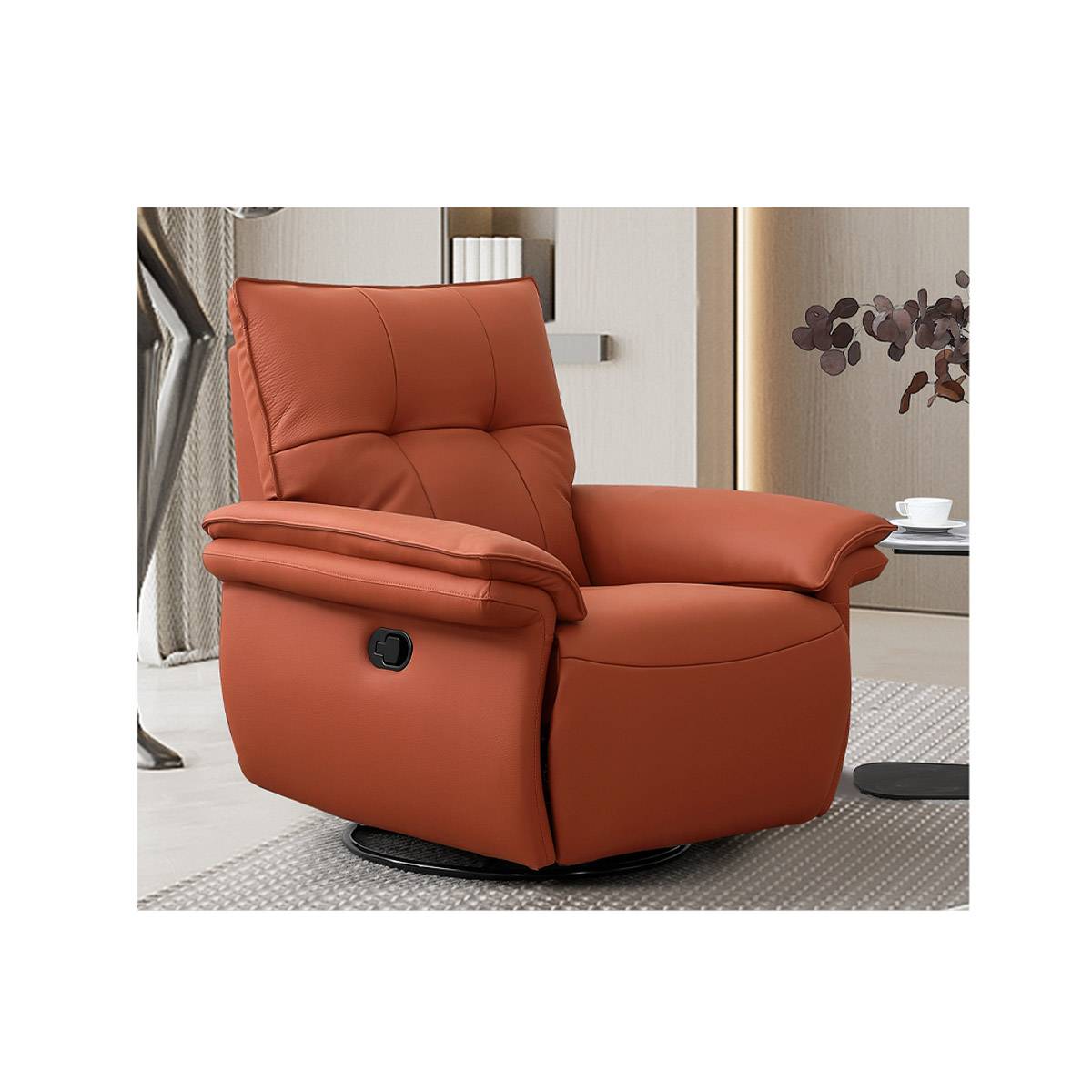 Side view of the orange leather recliner showing the manual recline lever.