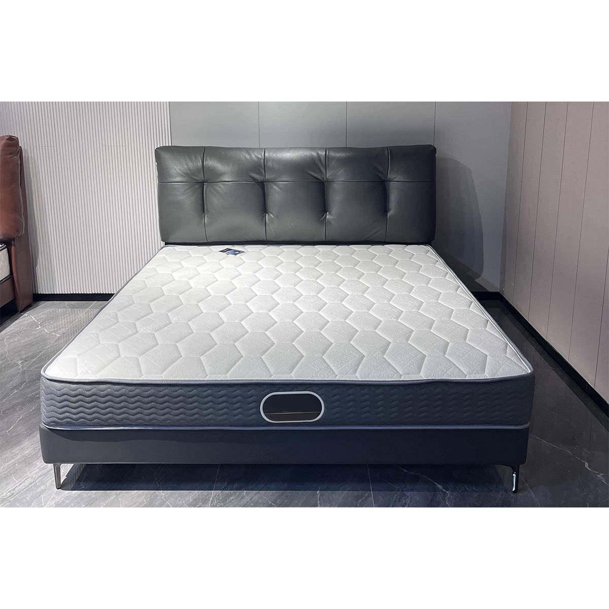 Front view of the bed frame with a mattress placed on top