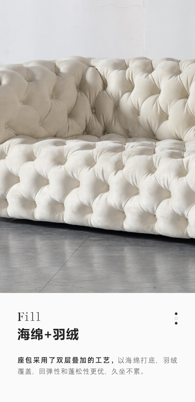 Close-up of the seat cushion showing the sponge and down filling layers.
