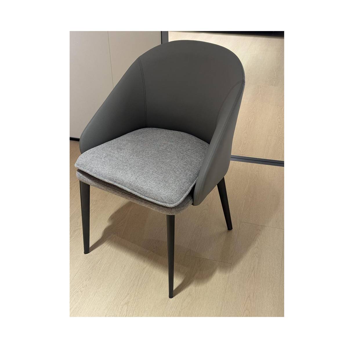 Grey modern dining chair with PU leather back and fabric seat