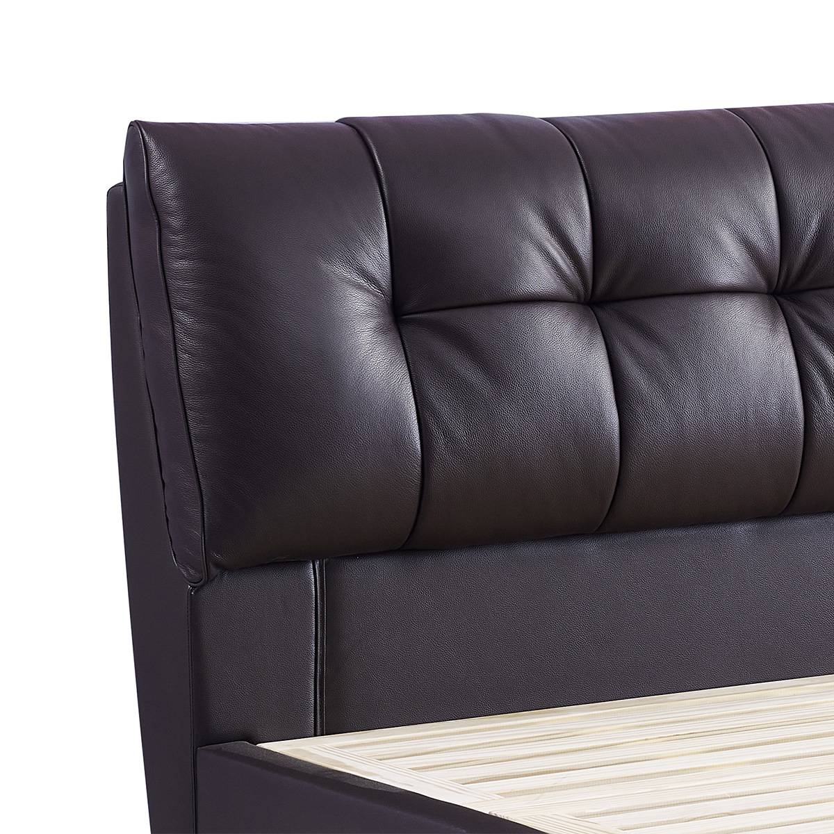 Close-up detail of the tufted leather headboard