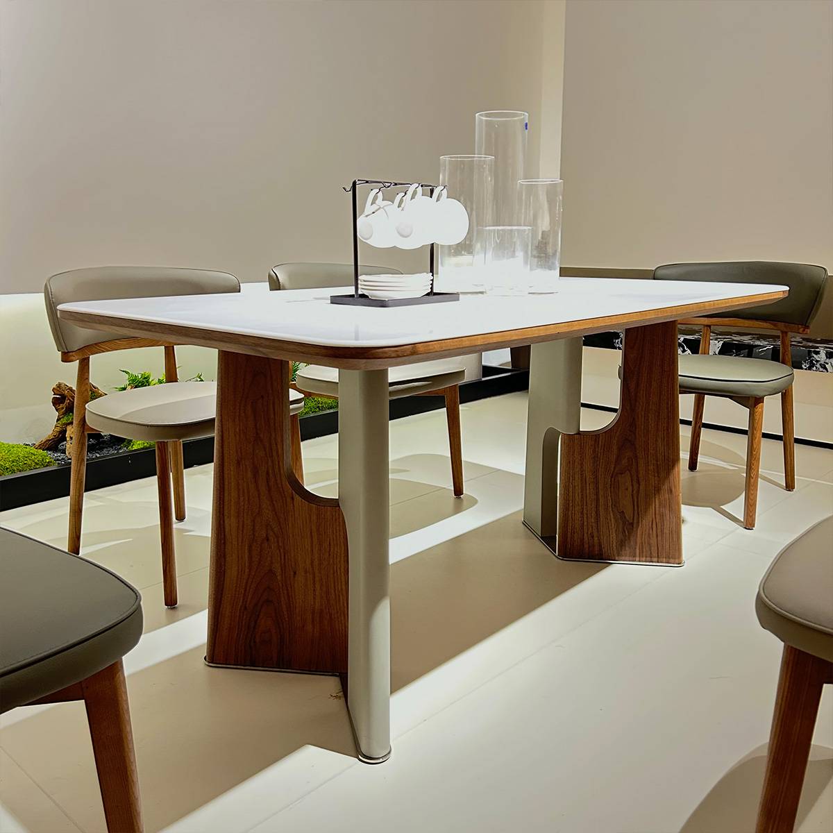 Close-up of the table base showing the stainless steel and wood construction
