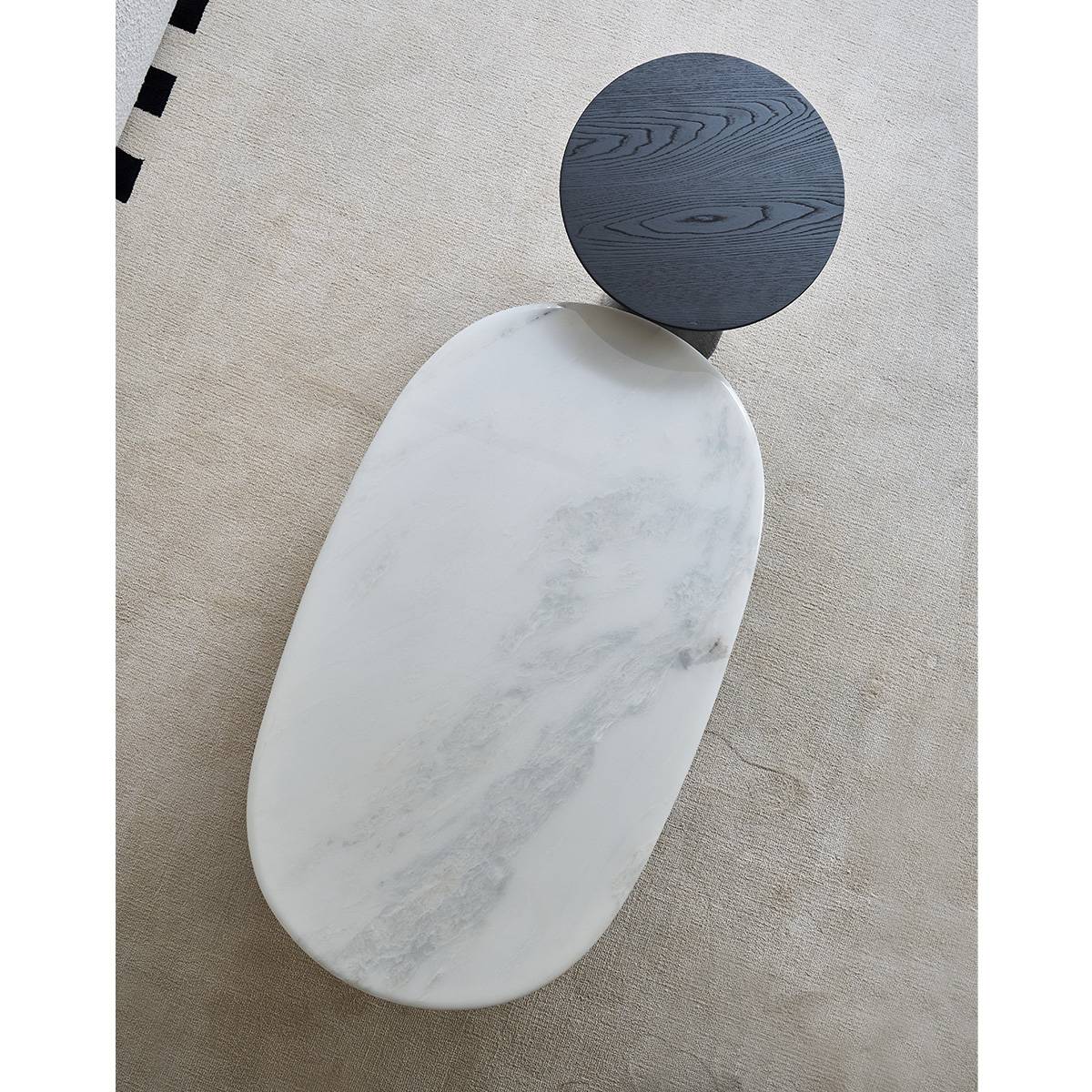 Top-down view showing the white marble texture of the coffee table