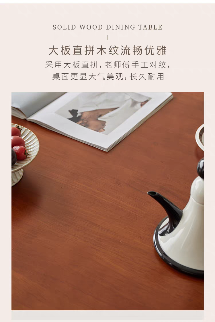 Close-up of the solid wood table surface showing grain texture with a magazine and teapot