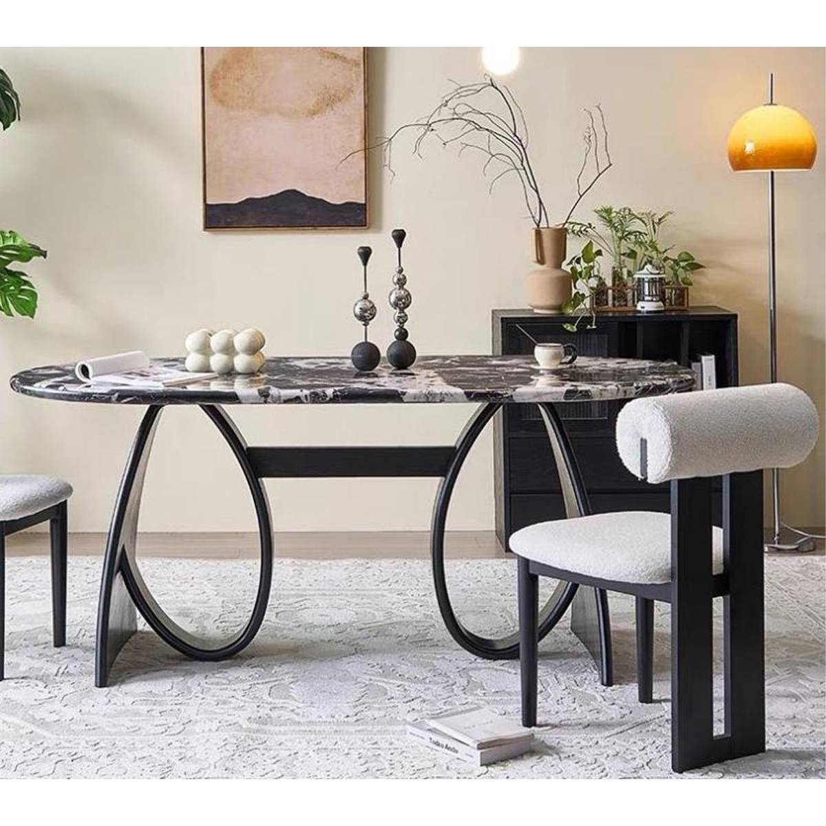 Side view of the oval marble dining table showing the curved leg design