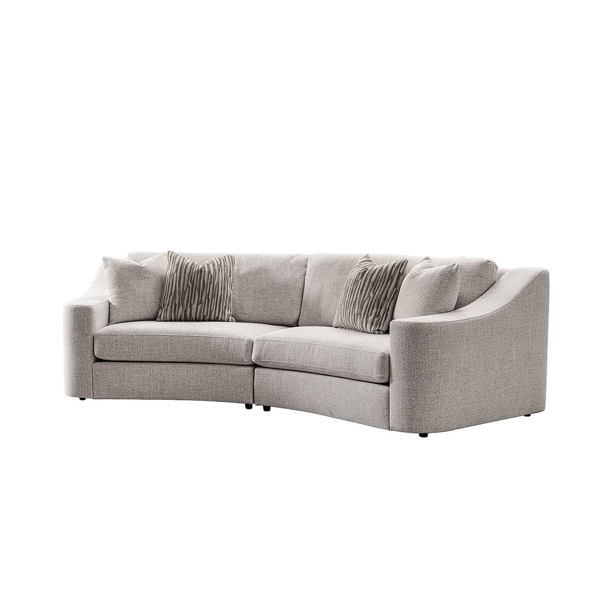 Three-quarter view of the sofa highlighting the cushions and pillows