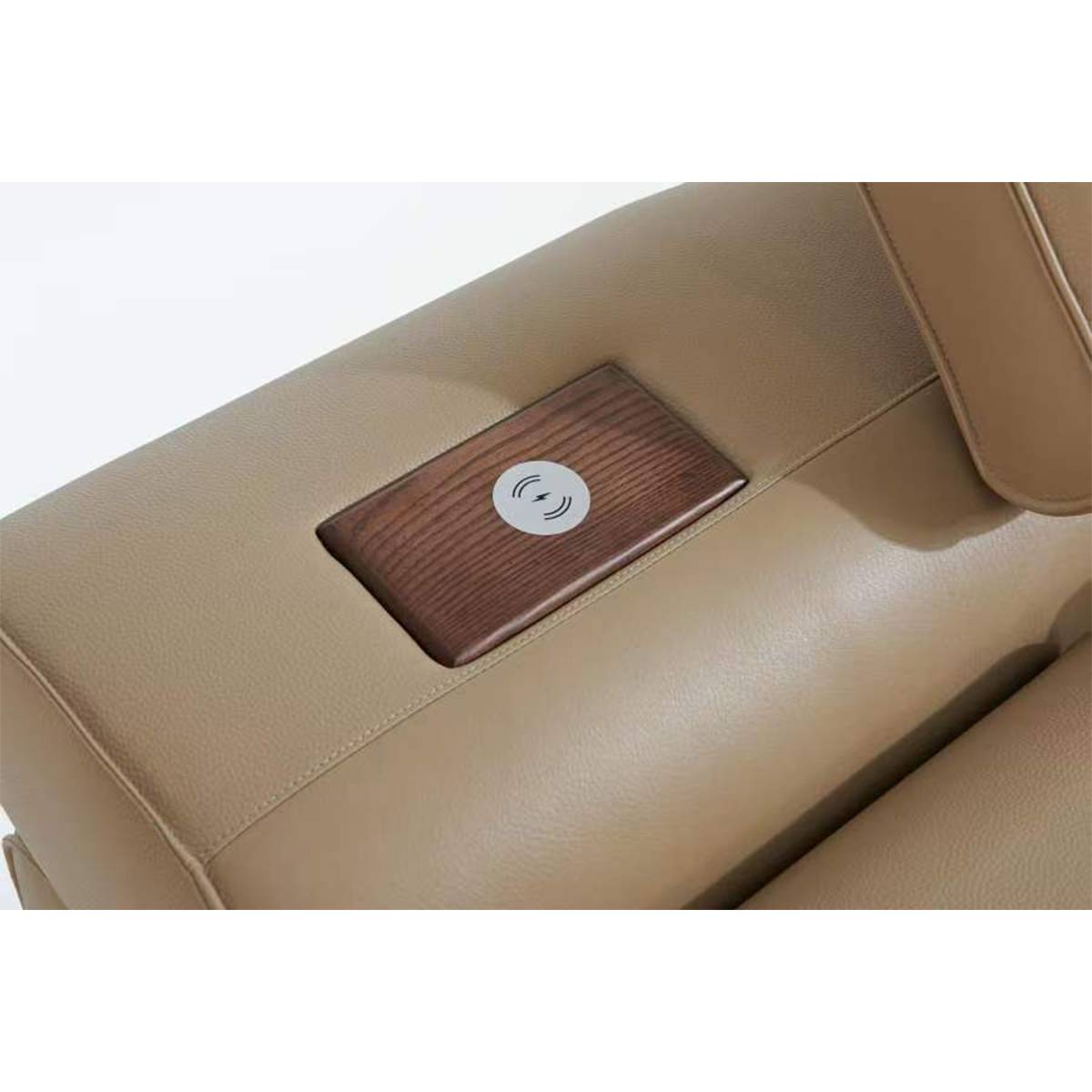 Close-up of the bed's integrated wireless charging station with wood grain finish