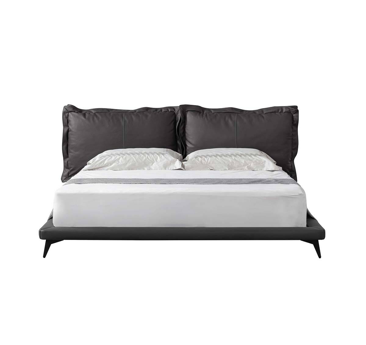 Front view of the black leather bed on white background