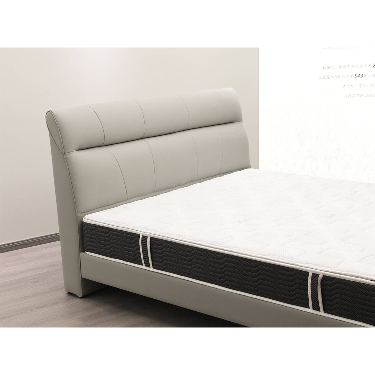 Close-up of the A19 bed headboard and mattress corner