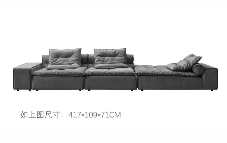 Grey extended L-shaped modular sofa with chaise on the right side