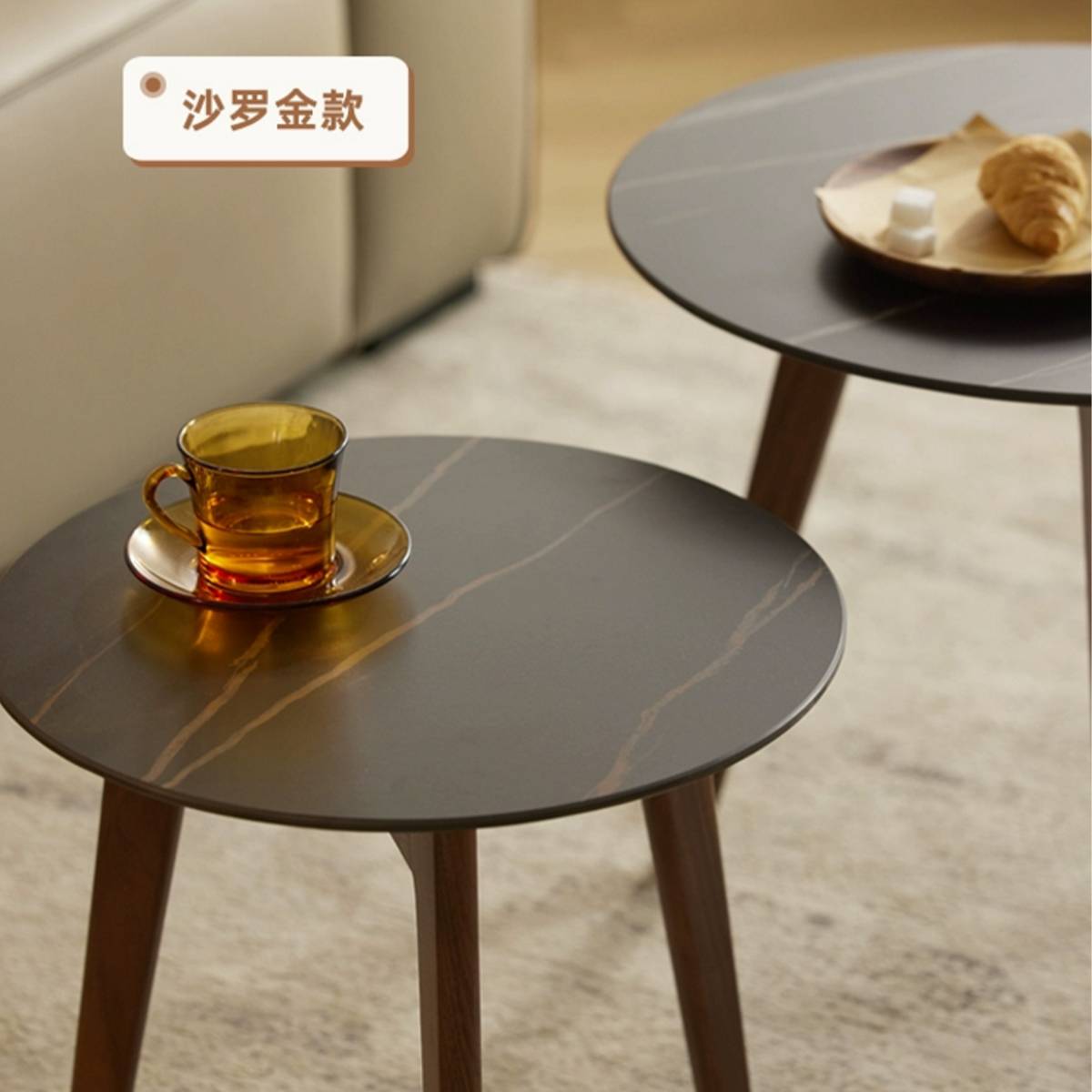 Close-up of the Saloro Gold sintered stone table surface with a coffee cup