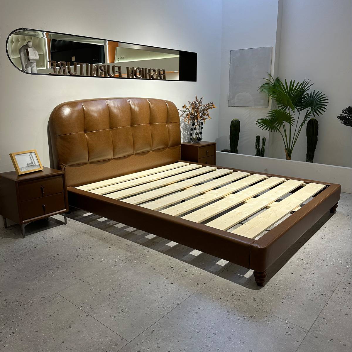 Bed frame without mattress showing wooden slats