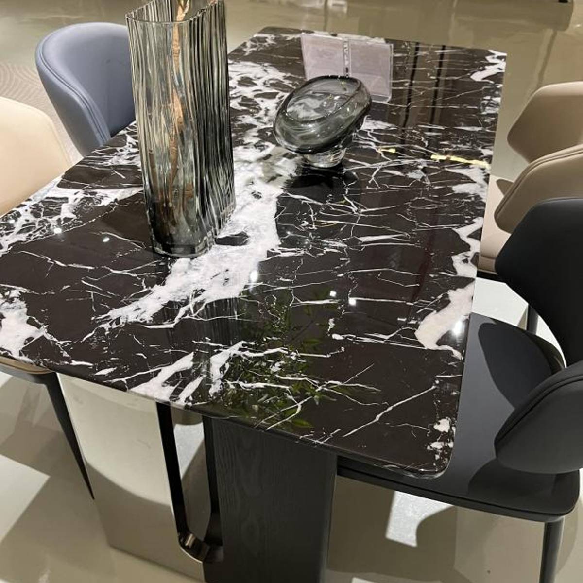 Close-up view of the black marble tabletop with white veining