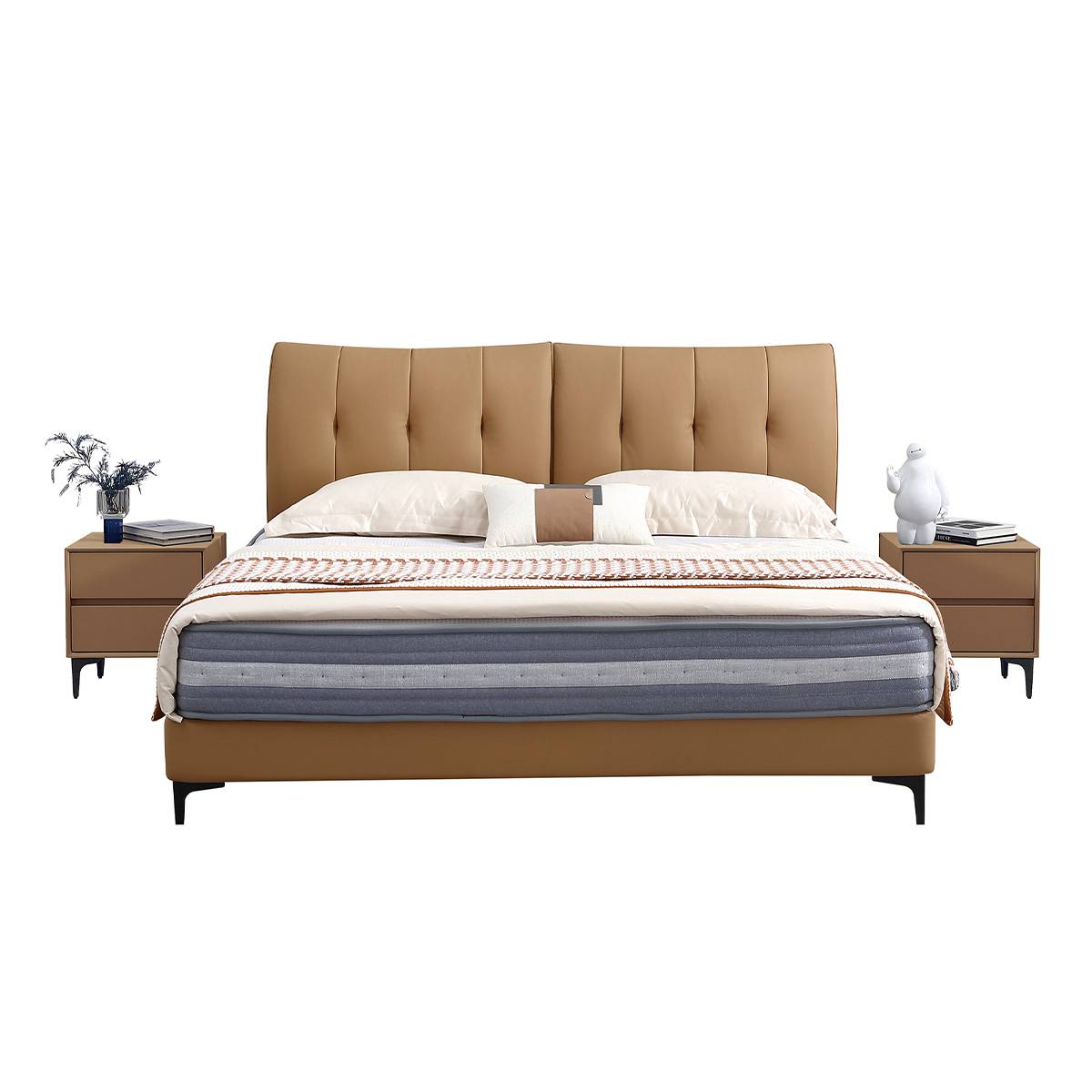 Front view of a tan leather upholstered bed with a tufted headboard, grey mattress, and white bedding.