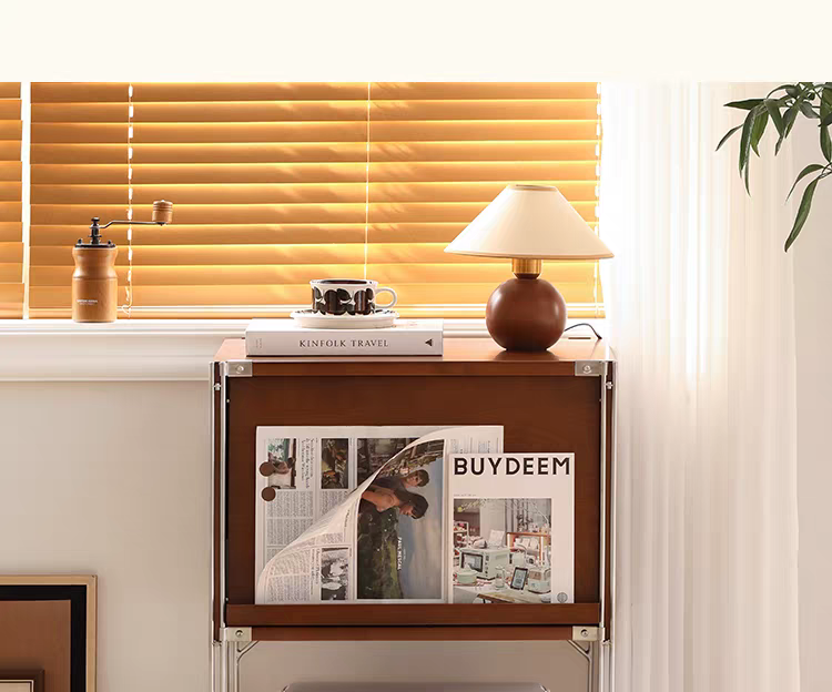 Sideboard with fluted glass door holding magazines