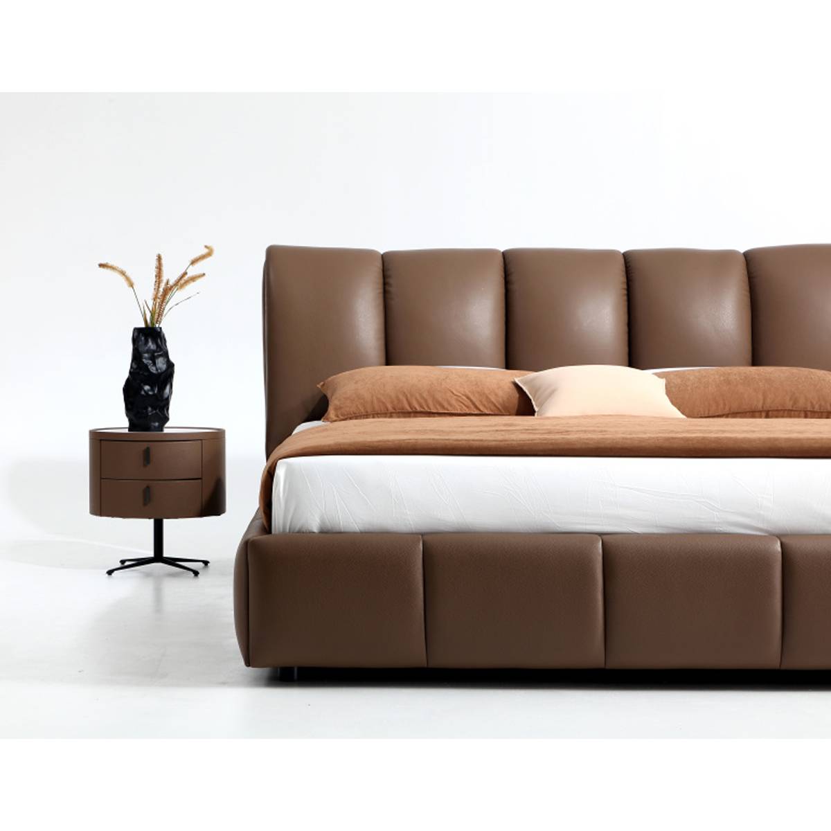 Close-up view of the bed base and headboard texture