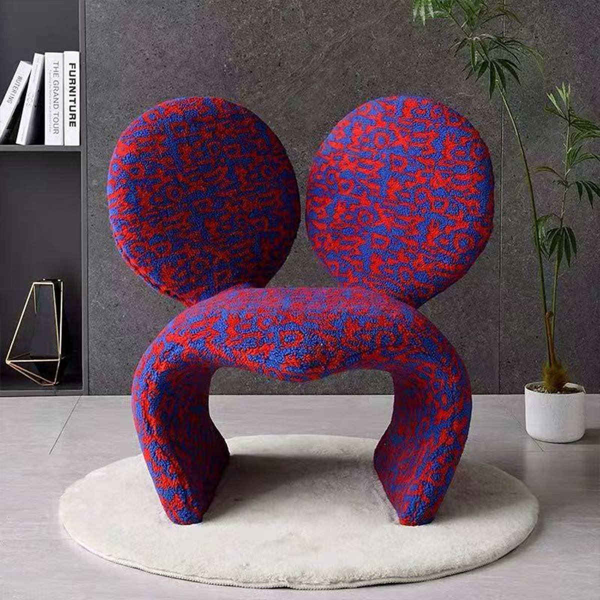 Front view of the red and blue patterned Mickey leisure chair