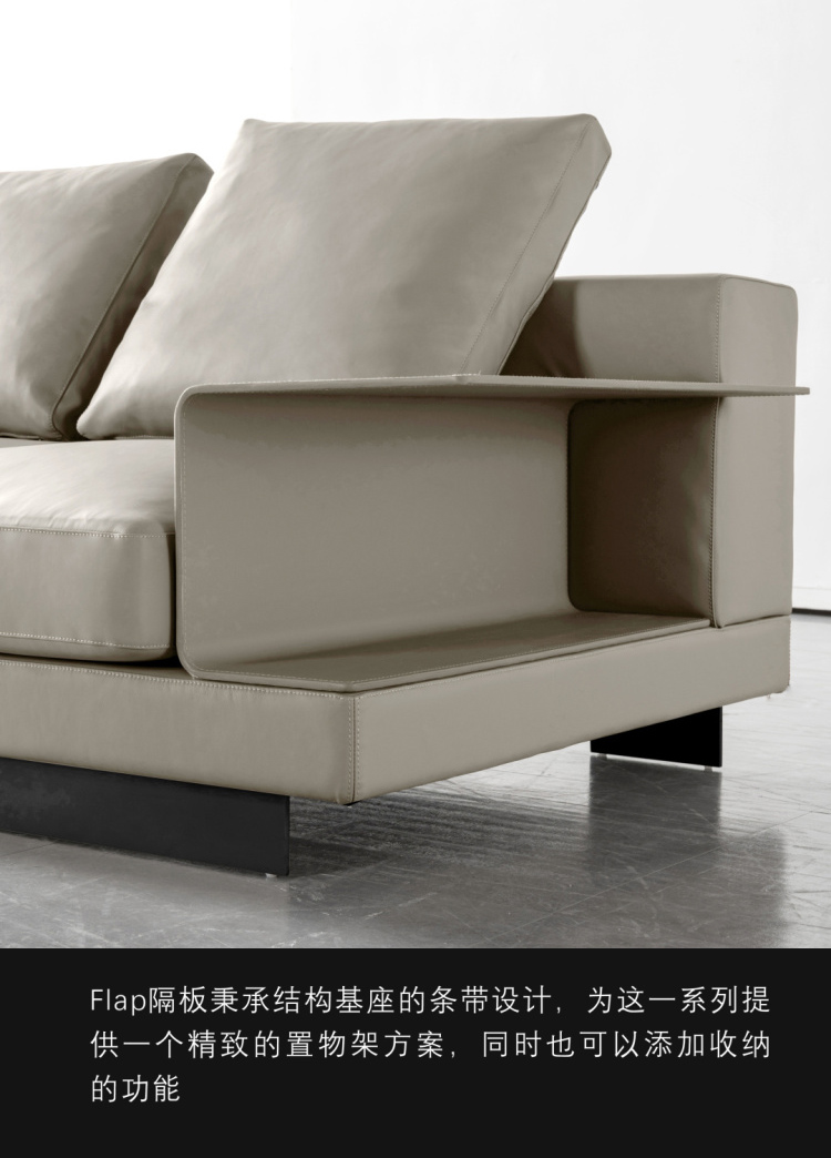 Side view of the sofa showing the integrated storage compartment within the armrest flap.